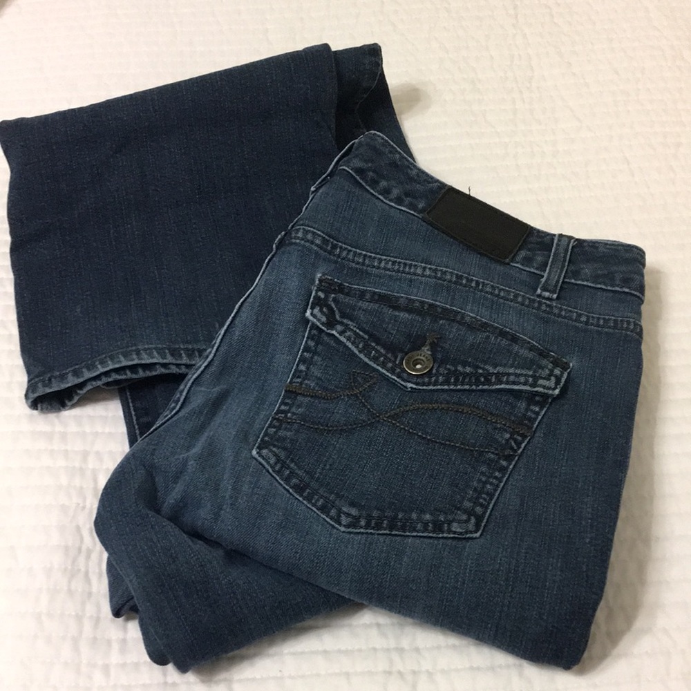 DKNY madison wide leg distressed jeans with back button pocket detail